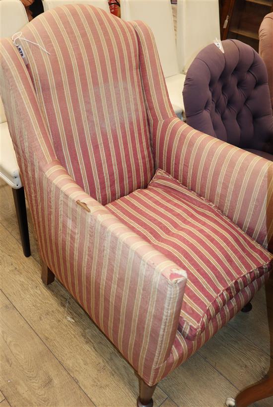 A 1920s upholstered armchair